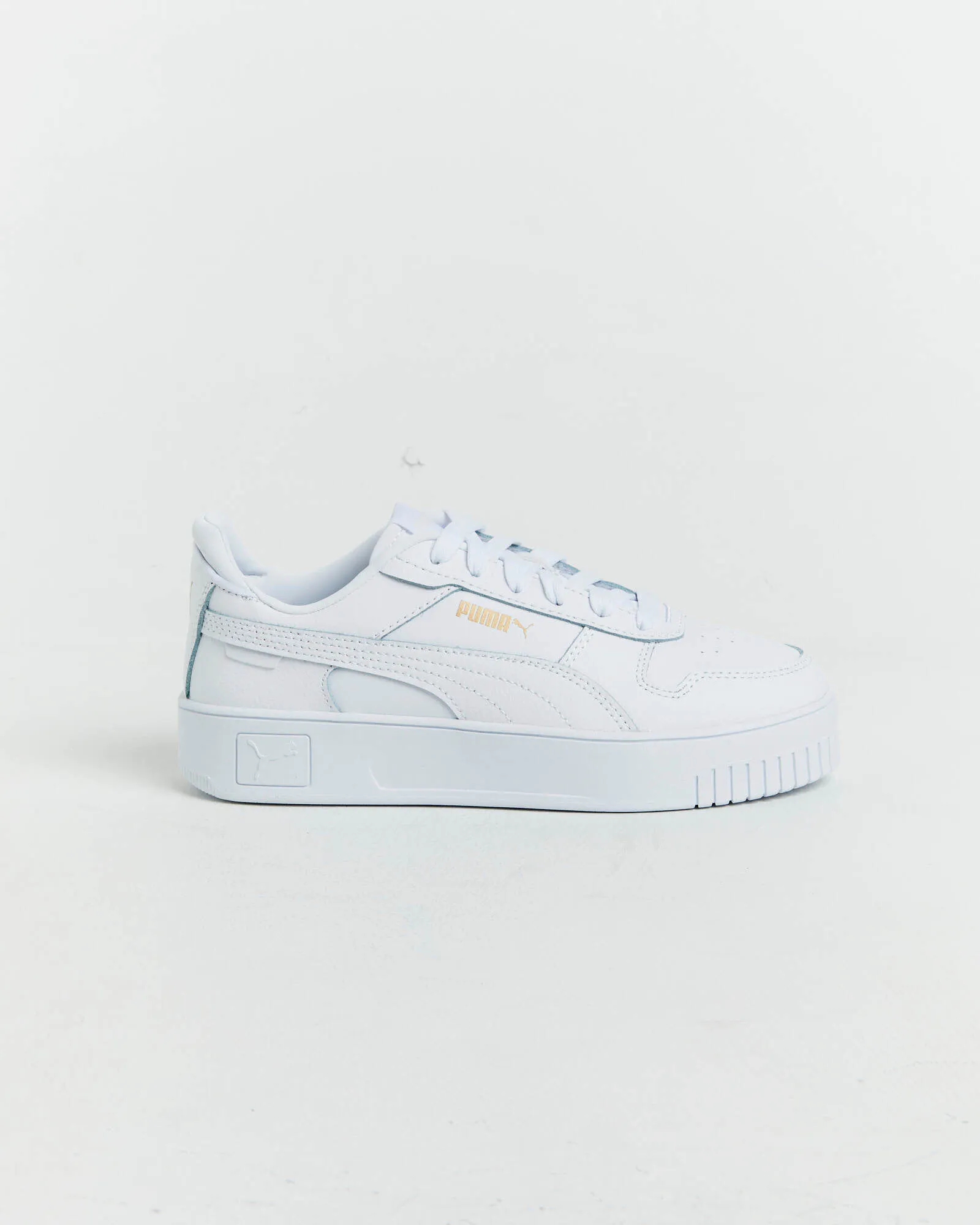 Puma Carina Street Puma Sneakers in White/Gold